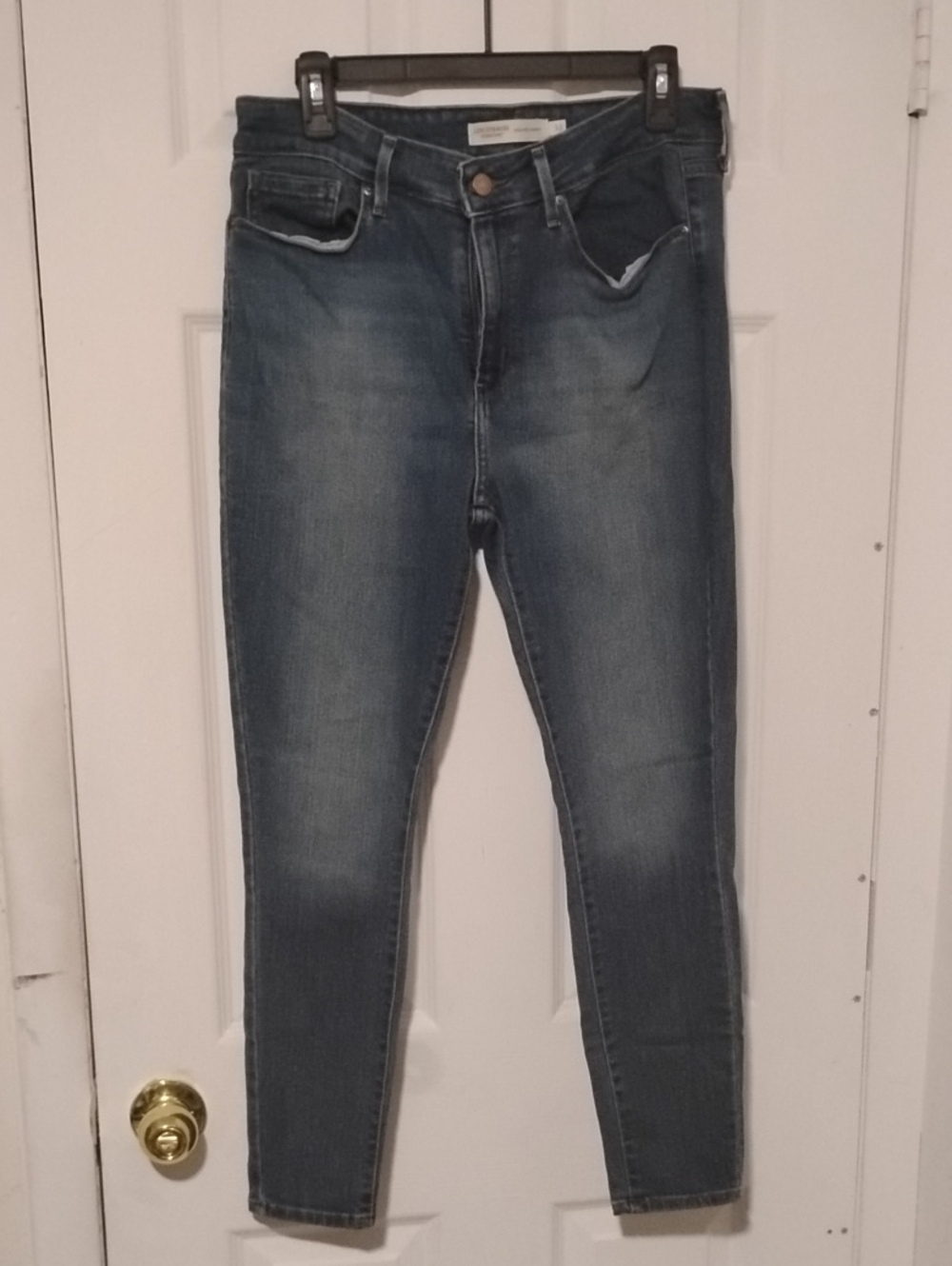 Levi Strauss High-Rise Skinny Jeans — Medium Blue Wash Size 12